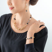 Armband Mysterious Mix gold-schwarz von COEUR DE LION – am Modell getragen