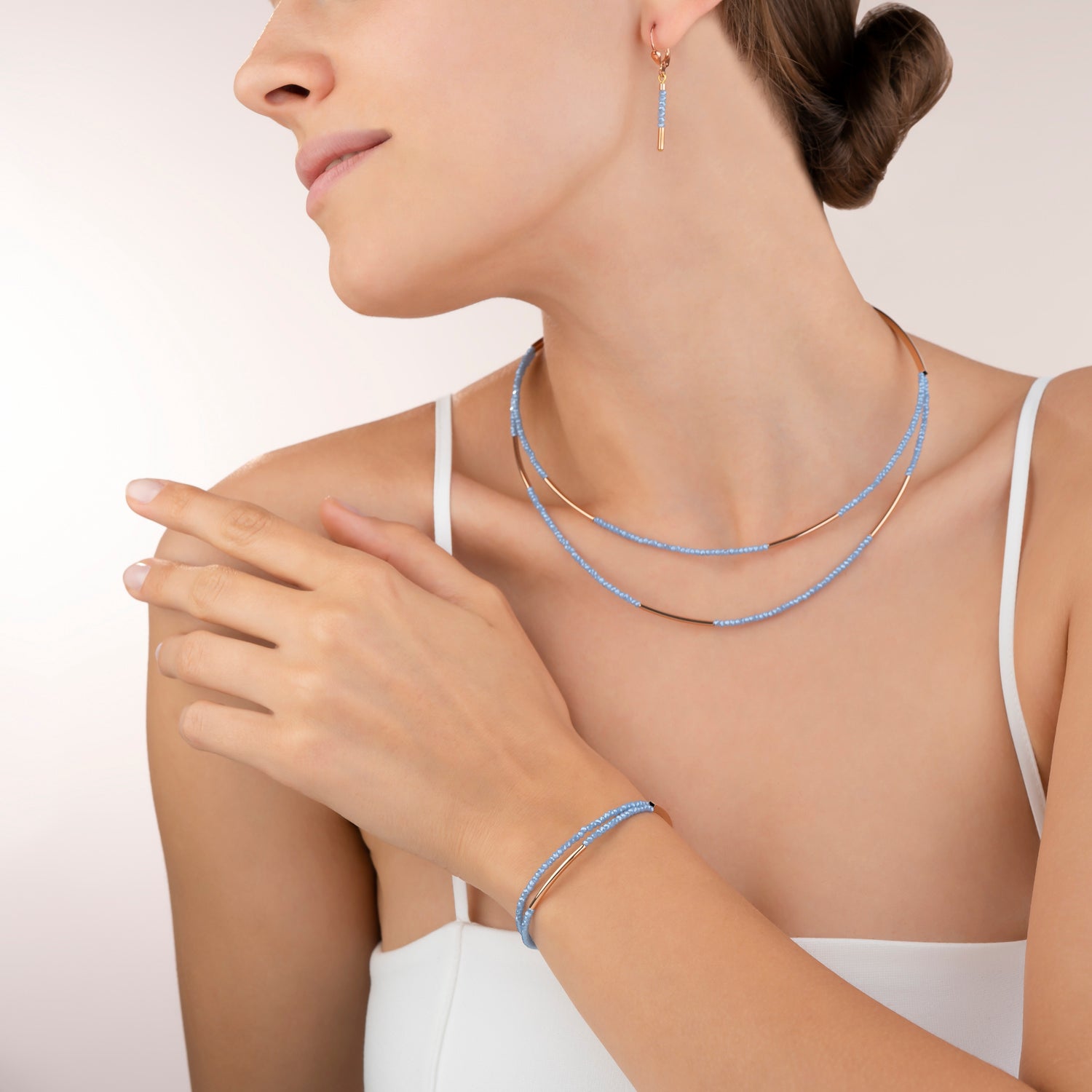 Armband Wasserfall small Edelstahl roségold & Glas hellblau