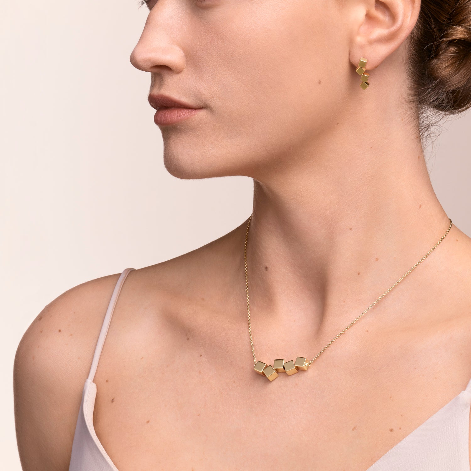 Halskette Dancing GeoCUBE® Edelstahl gold